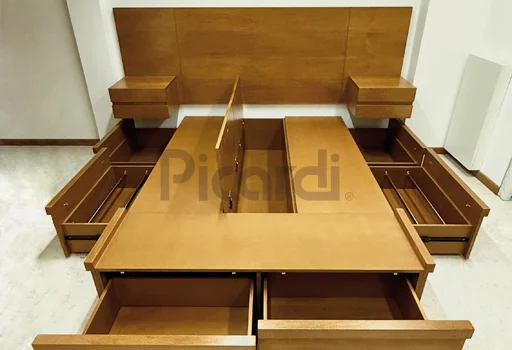 Cama box con mesas de luz flotantes y amplio espacio de guardado