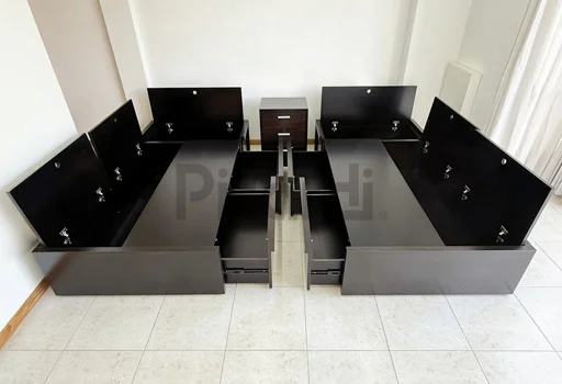 Dos camas box de una plaza con cajones y bauleras para dormitorio juvenil